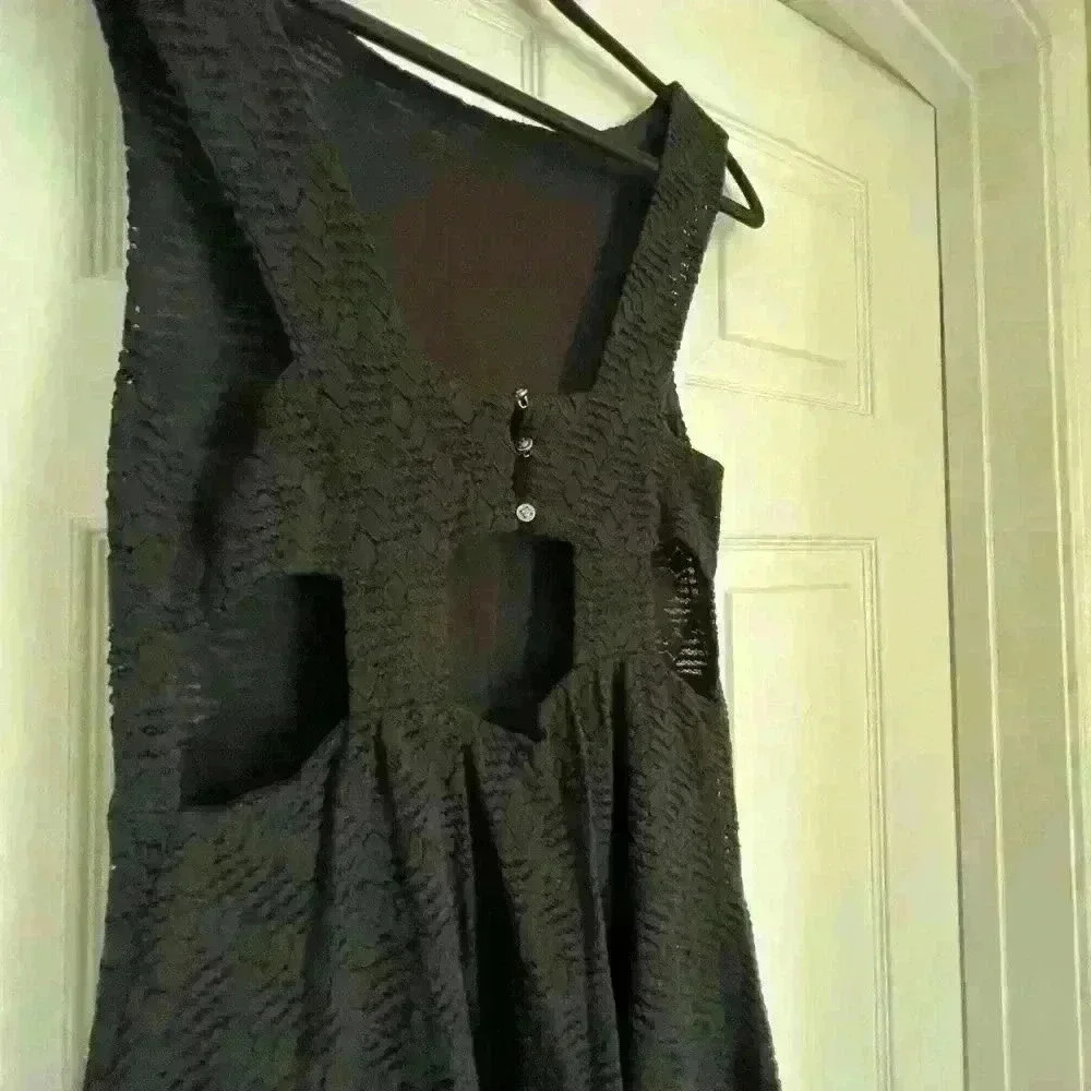 Free people black dress with cutout on the side and in the back. Size is XS/S. - Picture 7 of 12